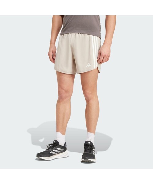 adidas（アディダス）の「オウン ザ ラン スリーストライプス ショーツ / Own The Run 3-Stripes Shorts（パンツ・メンズ・ベージュ/ブラック/ルシッドピンク/グリーンスパーク/ブラック・XL-5inch丈/2XL-5inch丈/3XL-5inch丈/S-7inch丈/M-7inch丈/L-7inch丈/XL-7inch丈/2XL-7inch丈/3XL-7inch丈/XS-7inch丈/2XS-5inch丈/XS-5inch丈/S-5inch丈/M-5inch丈/L-5inch丈/2XS-7inch丈/2XS-9inch丈/XS-9inch丈/S-9inch丈/M-9inch丈/L-9inch丈/XL-9inch丈/2XL-9inch丈/3XL-9inch丈）」の5枚目の写真