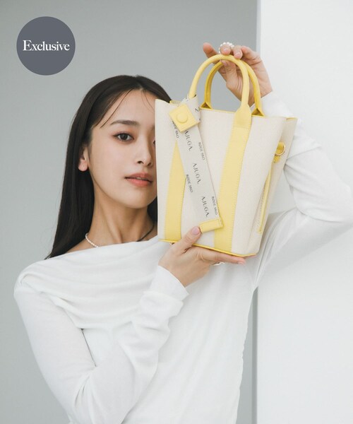 RODE SKO（ロデスコ）の「『別注』AJUGA.×RODE SKO　ロゴリボン付ショルダーバッグ（ショルダーバッグ・レディース・IVORYxBLK/OFFxCAMEL/IVORYxBEG/IVORYxYEL・One）」の4枚目の写真