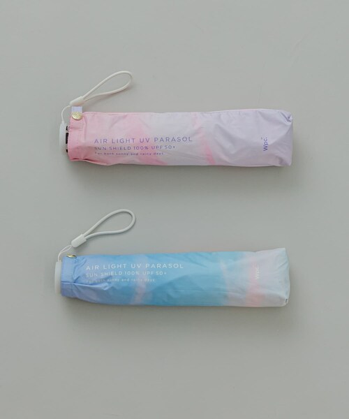 SMELLY（スメリー）の「【晴雨兼用】Wpc.　遮光軽量サンセットMINI（長傘・レディース・BLU/PNK・FREE）」の12枚目の写真