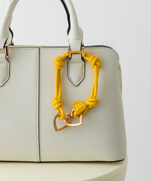 RODE SKO（ロデスコ）の「ノットチャーム（キーホルダー・レディース・SAX/OFF/YELLOW/PINK/MINT・one）」の4枚目の写真