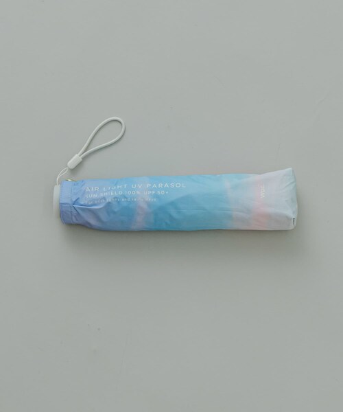 SMELLY（スメリー）の「【晴雨兼用】Wpc.　遮光軽量サンセットMINI（長傘・レディース・BLU/PNK・FREE）」の11枚目の写真