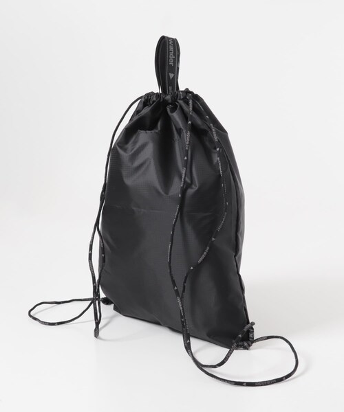 EKAL(エカル)の「and wander CRISPY RIP DRAWSTRING BAG(バックパック/リュック・レディース・BLACK/KHAKI・One)」の6枚目の写真
