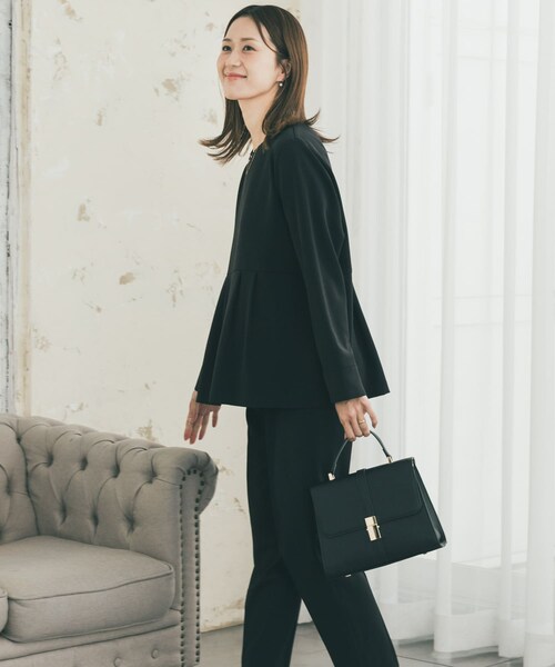 URBAN RESEARCH DOORS(アーバンリサーチドアーズ)の「ペプラムトップスセットアップ(セットアップ・レディース・NAVY/BLACK・S/M)」の3枚目の写真