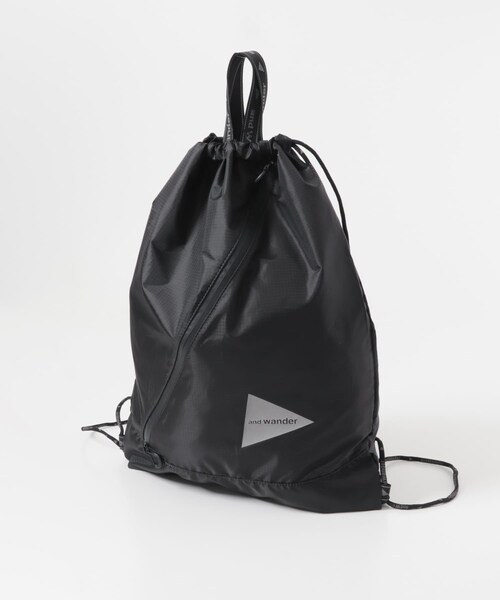 EKAL(エカル)の「and wander CRISPY RIP DRAWSTRING BAG(バックパック/リュック・レディース・BLACK/KHAKI・One)」の5枚目の写真