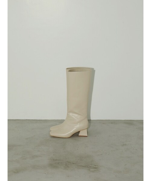 ELENDEEK（エレンディーク）の「SQUARE LONG BOOTS（ブーツ・レディース・アイボリー/ブラック/シルバー・37/38）」の2枚目の写真