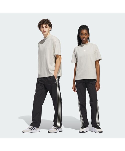 adidas(アディダス)の「バスケットボール トラックスーツ パンツ(ジェンダーニュートラル)(パンツ・メンズ・ブラック・J/S/M/L/XL/2XL/3XL/J/XS/XS/4XL/6XL/J/3XS/J/2XS)」の1枚目の写真