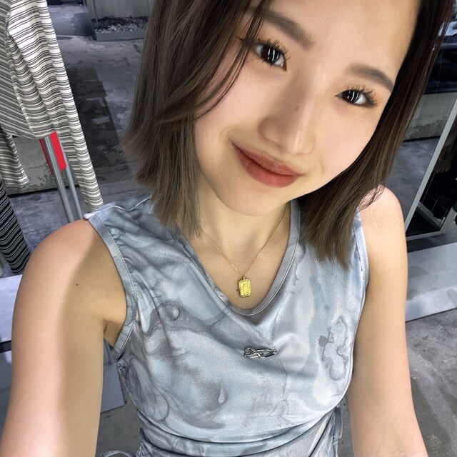 李　相美